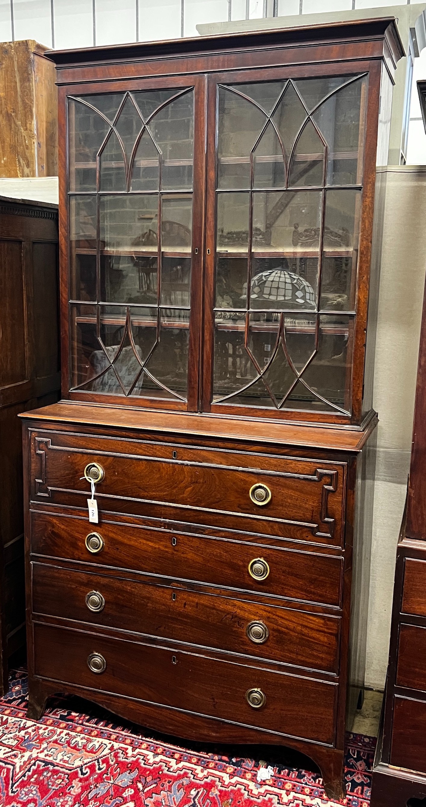 A George III mahogany secretaire bookcase, width 104cm, depth 52cm, height 210cm
